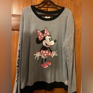 This long she’s sure it was bought at Disney and it is a Disney vans shirt